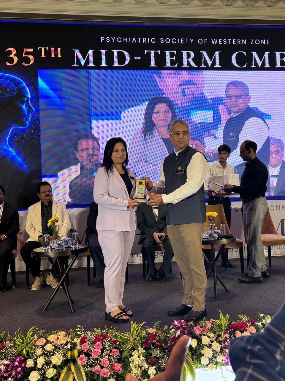 Dr. Roshita Khare receiving recognition at the 35th Mid-Term CME